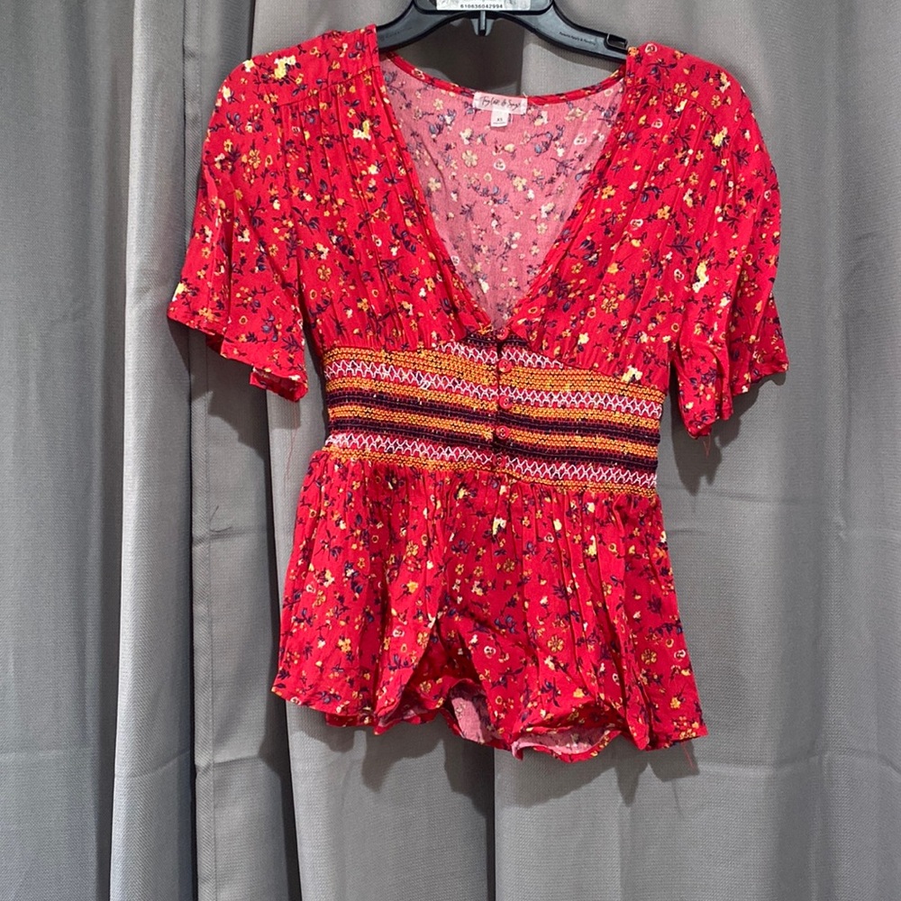 Red floral v-neck blouse